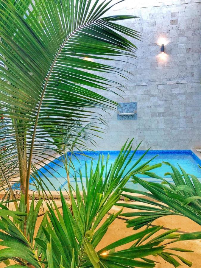 Los Arcos Hotel - Tulum Exterior photo The swimming pool at the hotel