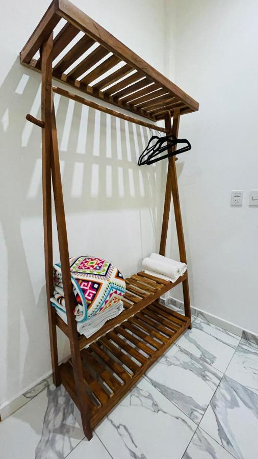 Los Arcos Hotel - Tulum Exterior photo A wooden clothes rack